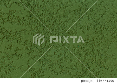 Green paint rough plaster wall stucco background structure abstract solid pattern texture 116774350