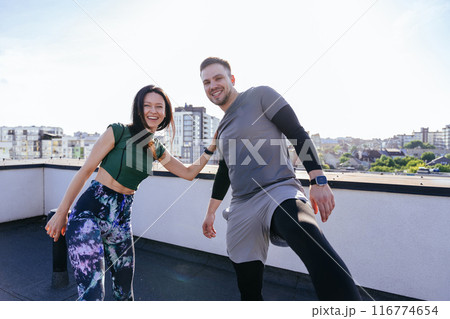 Concept of active and healthy lifestyle in the middle age. Fitness couple enjoying a sunny day, staying fit, and having fun together. Concept of active and healthy lifestyle in the middle age. Fitness couple enjoying a sunny day, staying fit, and having fun together. 116774654