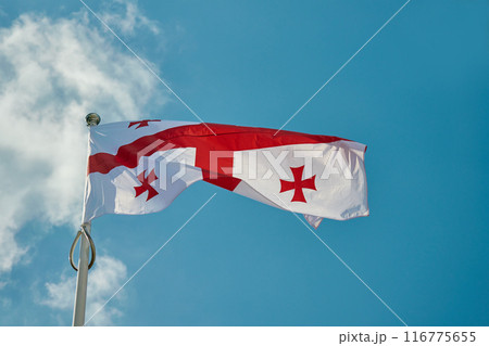 Georgian National Flag Waving in Clear Sky 116775655
