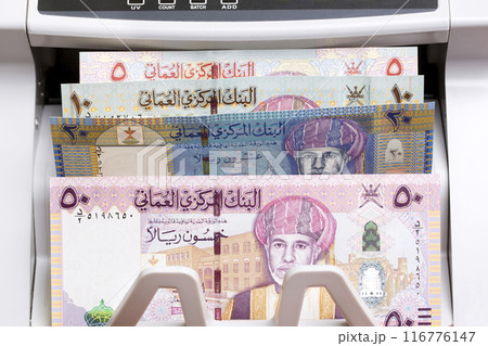 Omani rial in the counting machine 116776147
