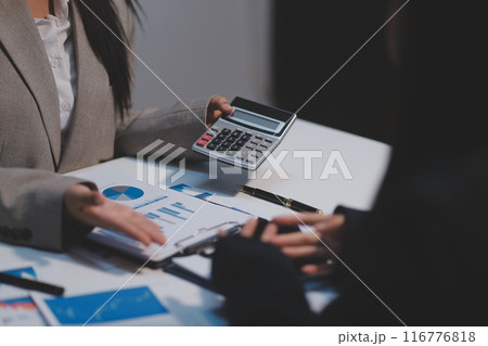 Close up of Business team analyzing income charts and graphs with modern laptop computer. Business analysis and strategy concept. Close up of Business team analyzing income charts and graphs with modern laptop computer. Business analysis and strategy concept. 116776818