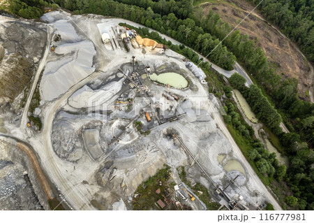 Sand open-pit mining quarry with processing plant for crushed stone. Extracting of natural resources for construction industry Sand open-pit mining quarry with processing plant for crushed stone. Extracting of natural resources for construction industry 116777981