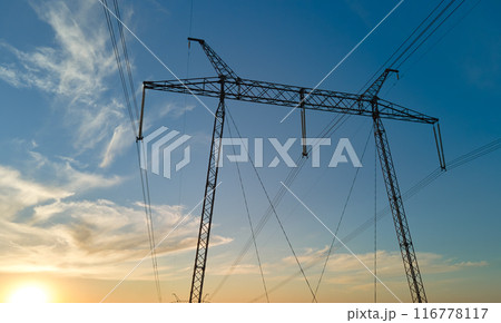 High voltage tower with electric power lines at sunset. Transmission of electricity High voltage tower with electric power lines at sunset. Transmission of electricity 116778117