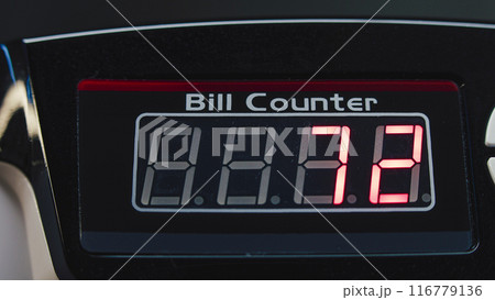 Electronic screen showing the number of banknotes counting in bill counter 116779136