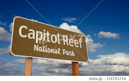 Capitol Reef National Park (Utah) Road Sign Against Blue Sky and Clouds. Capitol Reef National Park (Utah) Road Sign Against Blue Sky and Clouds. 116781258