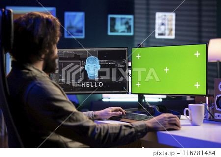 Sentient AI on green screen monitor interacting with computer engineer, greeting him after modifying own source code. Self aware artificial intelligence on mockup PC becoming alive Sentient AI on green screen monitor interacting with computer engineer, greeting him after modifying own source code. Self aware artificial intelligence on mockup PC becoming alive 116781484