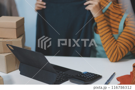 Asian female medical doctor use stethoscope to listen examine check senior elderly patient heart 116786312