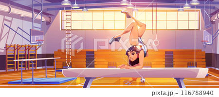 Female gymnast doing acrobatic element on gym beam Female gymnast doing acrobatic element on gym beam 116788940