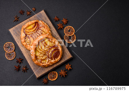 Delicious sweet crispy galettes with fruits and cinnamon Delicious sweet crispy galettes with fruits and cinnamon 116789975