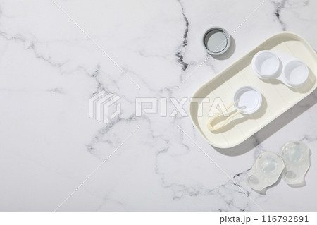 Contact lenses for eyes with a container for their storage Contact lenses for eyes with a container for their storage 116792891