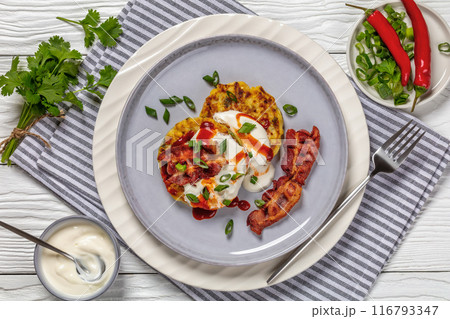 tasty cheese sweet corn pancakes with fried bacon 116793347