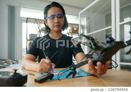 Master Making List Of Broken Details Of Drone 116794948