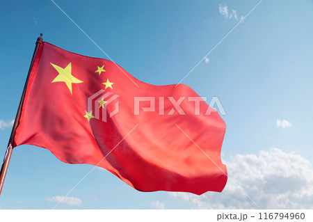 A red and yellow Chinese flag is flying in the sky 116794960