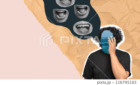 A man with a mask on his face is looking at the camera 116795183