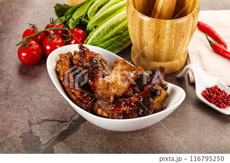 Grilled pork ribs in barbecue sauce 116795250