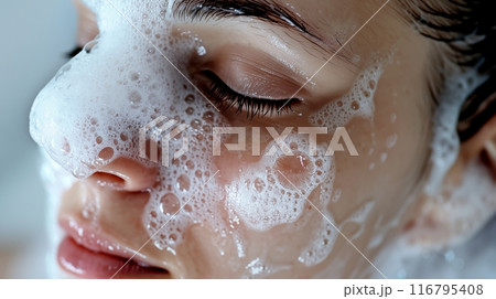 The woman cleanses her face with facial foam, effectively removing impurities and leaving her skin refreshed, rejuvenated, and glowing. AI Generated The woman cleanses her face with facial foam, effectively removing impurities and leaving her skin refreshed, rejuvenated, and glowing. AI Generated 116795408