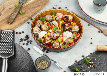 Escargot snail filled with garlic 116795451