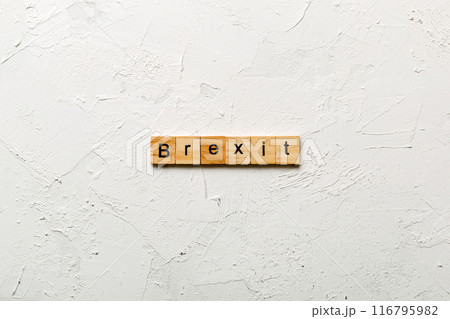 Brexit word written on wood block. Brexit text on cement table for your desing, concept 116795982
