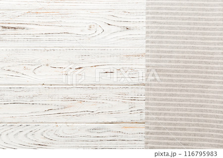 top view with gray kitchen napkin isolated on table background. Folded cloth for mockup with copy space, Flat lay. Minimal style top view with gray kitchen napkin isolated on table background. Folded cloth for mockup with copy space, Flat lay. Minimal style 116795983
