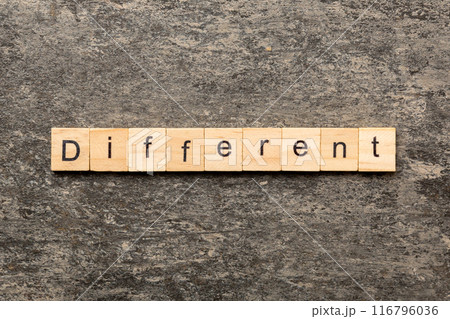 different word written on wood block. different text on table, concept. different word written on wood block. different text on table, concept. 116796036