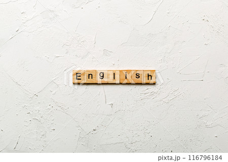 english word written on wood block. english text on cement table for your desing, concept 116796184