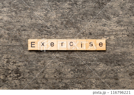 exercise word written on wood block. exercise text on table, concept 116796221