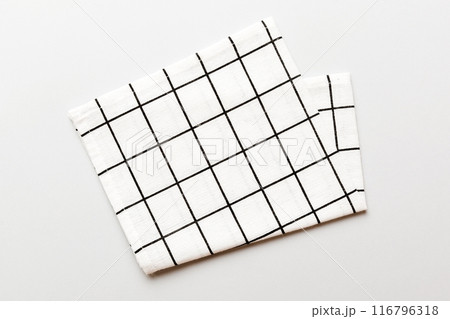 top view with white empty kitchen napkin isolated on table background. Folded cloth for mockup with copy space, Flat lay. Minimal style top view with white empty kitchen napkin isolated on table background. Folded cloth for mockup with copy space, Flat lay. Minimal style 116796318