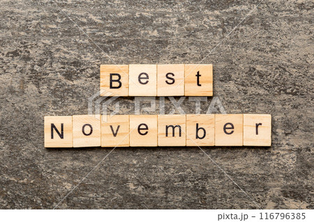 best november word written on wood block. best november text on table, concept 116796385