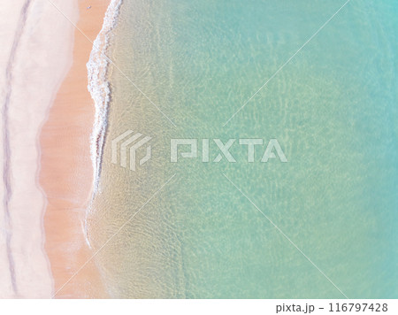 Aerial top view nature background of waves crashing in the ocean sea water, Drone view of sea waves in bird eye view photo,Beach sea background 116797428