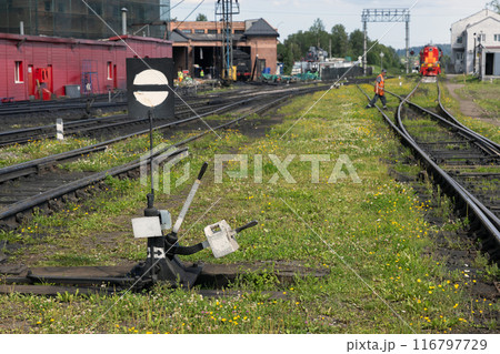 Old manual powered railroad switch with black and white details 116797729