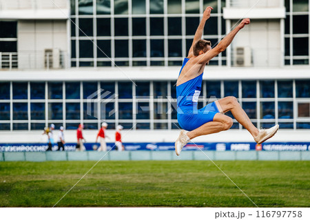 long jump men, athlete in flight, athletics competition 116797758