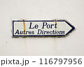 an old directional sign for the harbour 116797956