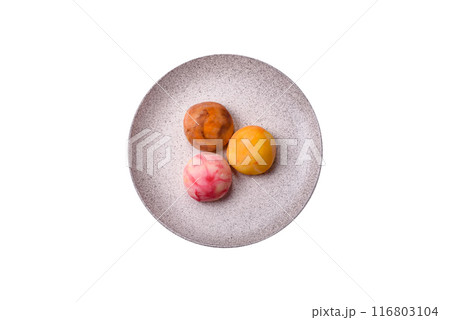 Delicious colorful asian mochi sweets with rice dough shell Delicious colorful asian mochi sweets with rice dough shell 116803104