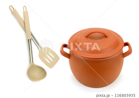 Kitchen ladle, kitchen spatula and clay pan isolated on white. Collage. 116803935