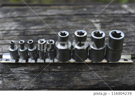 A set of end heads and nozzles. Chrome keys. Tools. 116804239