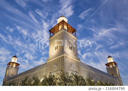 King Hussein Bin Talal mosque in Amman (at night), Jordan. Against the background of a beautiful sky with clouds King Hussein Bin Talal mosque in Amman (at night), Jordan. Against the background of a beautiful sky with clouds 116804790