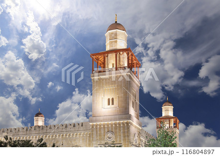 King Hussein Bin Talal mosque in Amman (at night), Jordan.  Against the background of a beautiful sky with clouds 116804897