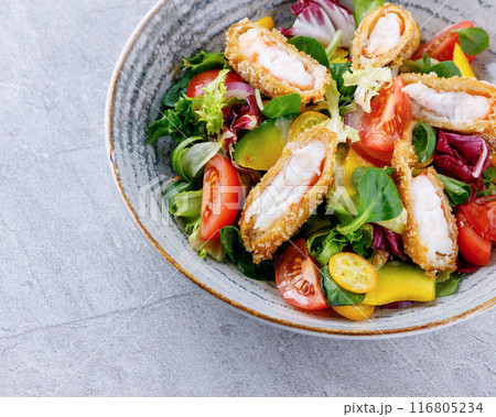 salad with panko shrimp, avocado and mango on a gray background for the restaurant menu, salad with panko shrimp, avocado and mango on a gray background for the restaurant menu, 116805234