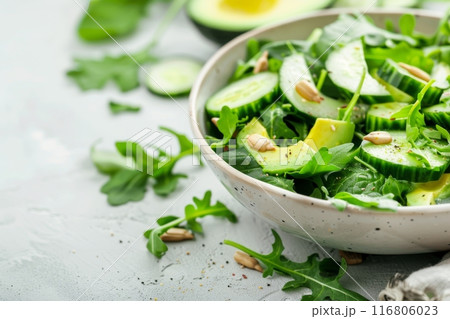 Avocado, Cucumber, and Arugula Salad 116806023