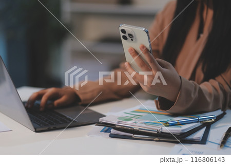 Hand woman work using smartphone with white background for advertising, smartphone screen blank mockup, clipping path. Hand woman work using smartphone with white background for advertising, smartphone screen blank mockup, clipping path. 116806143