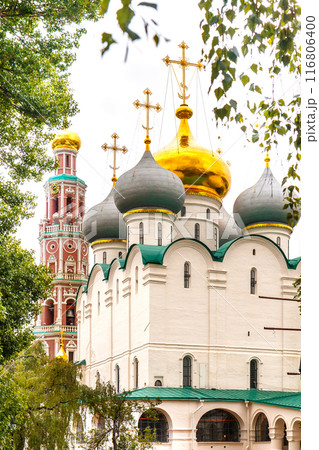 MOSCOW, RUSSIA - JUNE 09, 2021 Church building with golden domes Smolensky cathedral on the territory of the Novodevichy Monastery in the Russian capital Moscow, dated 1524 - 1525 116806400