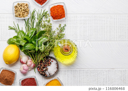 Various herbs and spices on the table 116806468