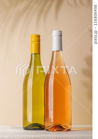 White wine bottle and wine glass 116806498