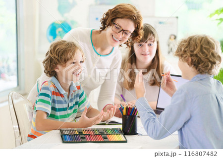 Back to school. Kids and teacher in classroom 116807482