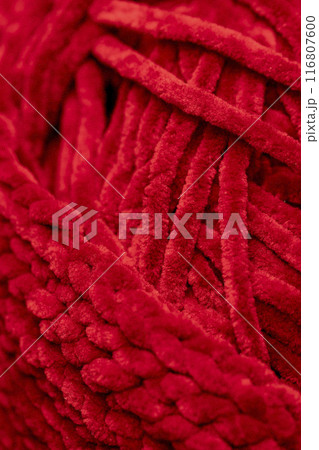 new soft red threads with traces of other threads in close-up 116807600
