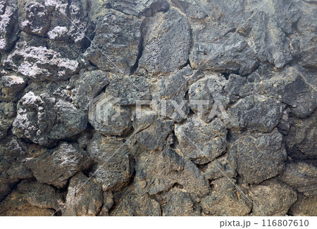 Black volcanic rock background 116807610