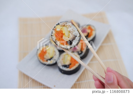 Sushi rolls on a plate on a white background. Japanese food 116808873