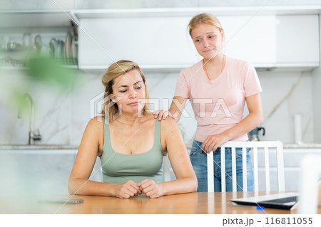 Teenage daughter asking for forgiveness from upset mother 116811055