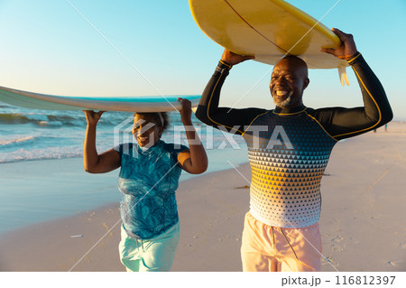 Senior African American couple enjoys a beach day, with copy space Senior African American couple enjoys a beach day, with copy space 116812397