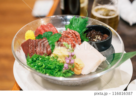 horse meat pieces sashimi or Japanese Basashi. Baniku includes lean meat, superb marbling, mane and liver. Premium meat and famous food in Matsumoto city, Nagano Prefecture, Japan 116816387